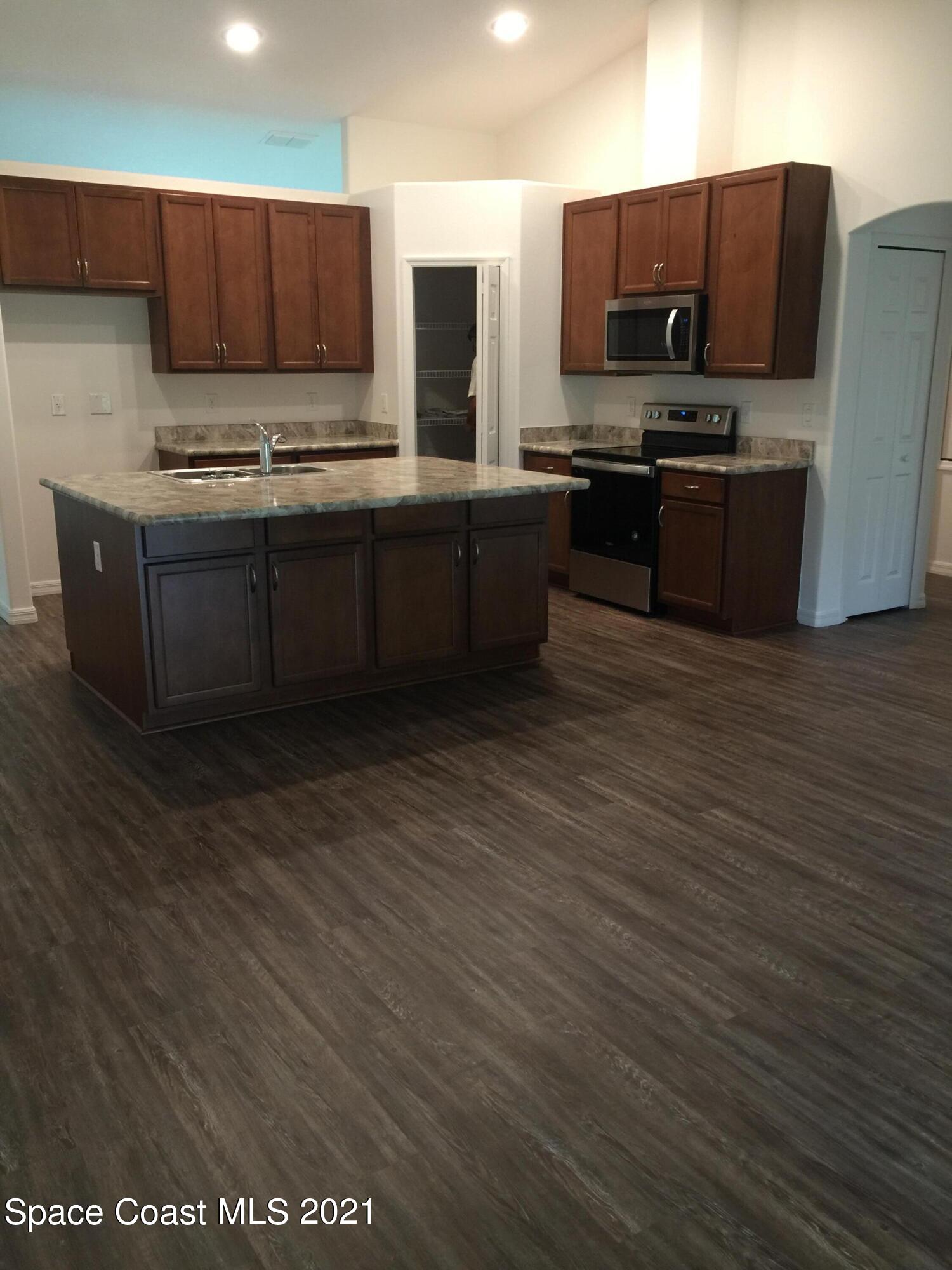 1217 Harlingen Road Southwest Palm Bay, FL 32908 - Photo 4 of 16 IMG_5518 2