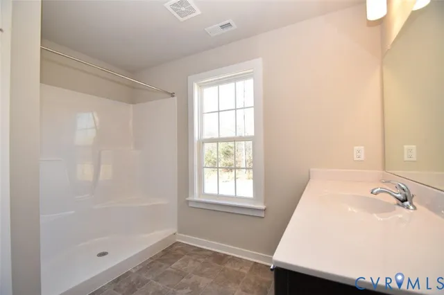 a bathroom with a sink and a bathtub