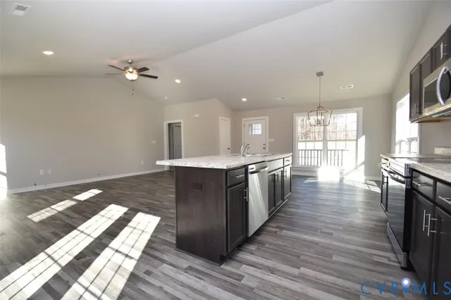 a large kitchen with lots of counter space and appliances