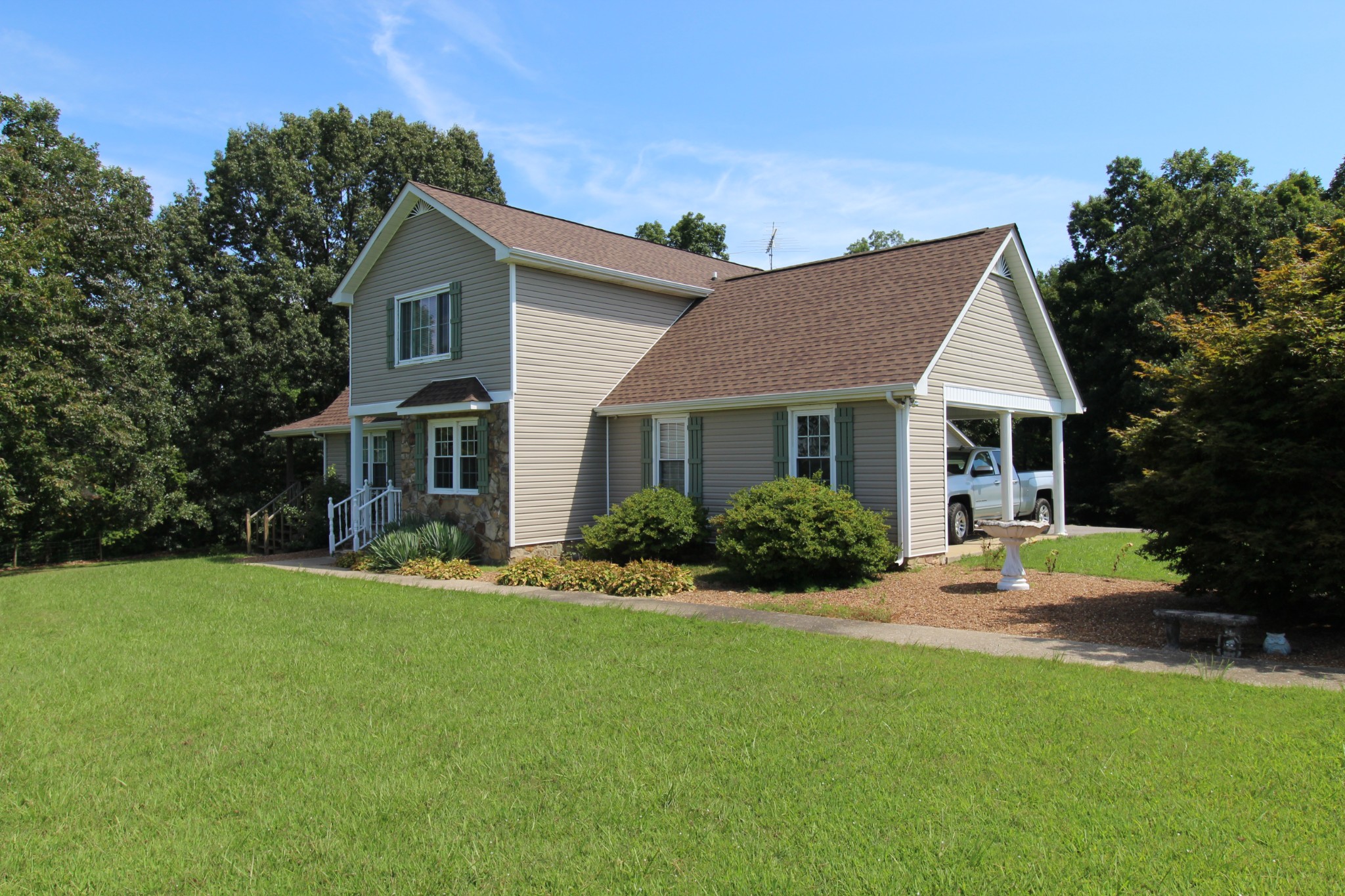 1643 Carthage Road Red Boiling Springs, TN 37150 - Photo 8 of 17 a front view of a house with a yard