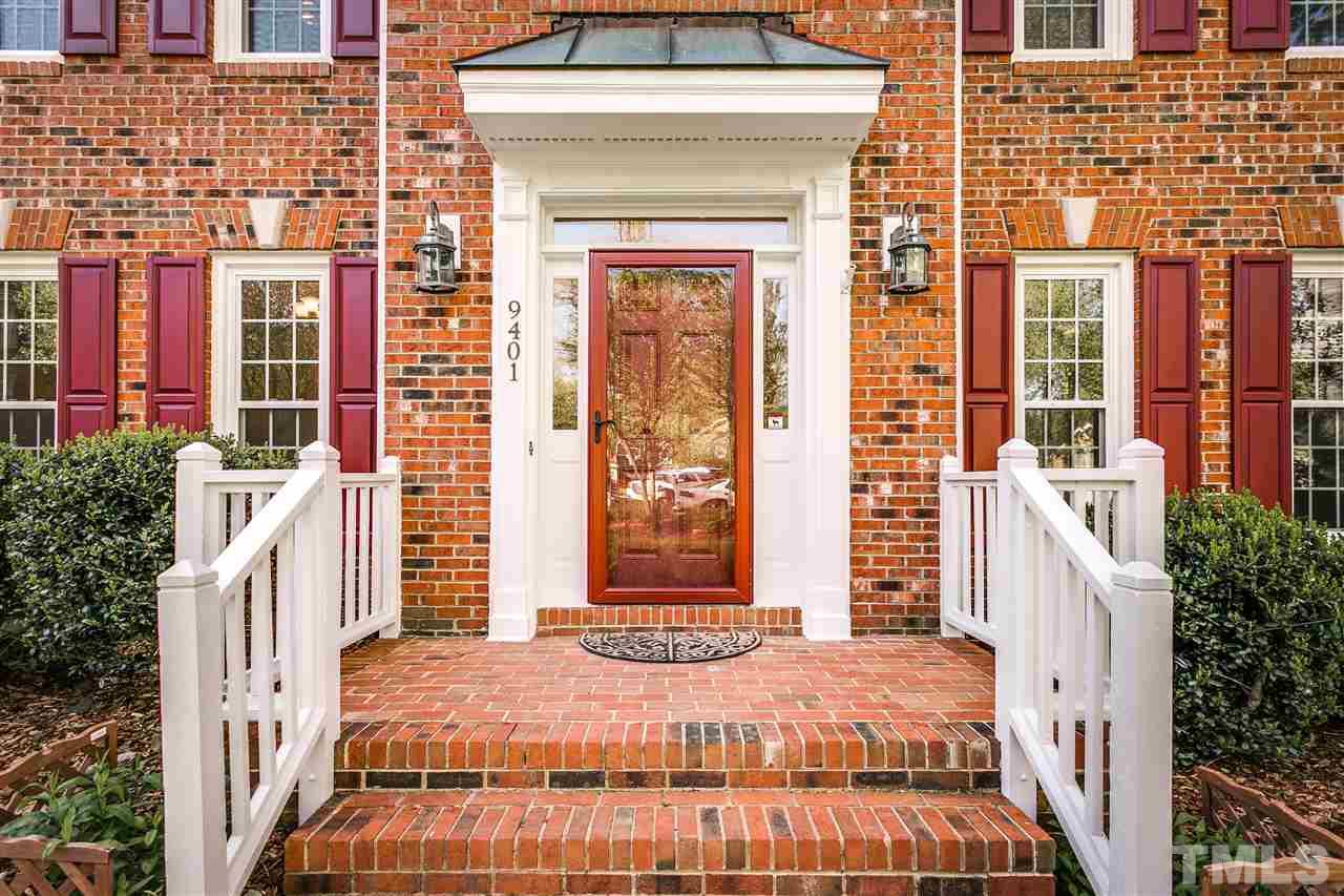 9401 Floral Ridge Court Raleigh, NC 27613 - Photo 2 of 25 a house view with a outdoor space