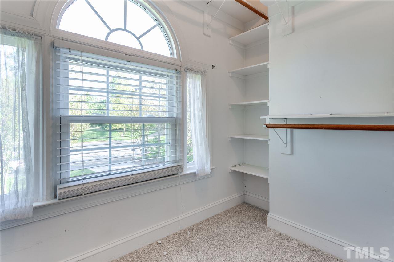 9401 Floral Ridge Court Raleigh, NC 27613 - Photo 18 of 25 a view of an empty room with a window