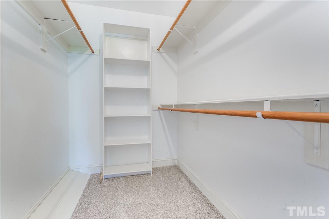 9401 Floral Ridge Court Raleigh, NC 27613 - Photo 19 of 25 a view of an empty walk in closet