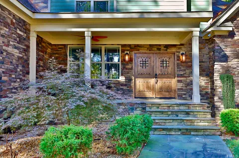 a front view of a house with a porch