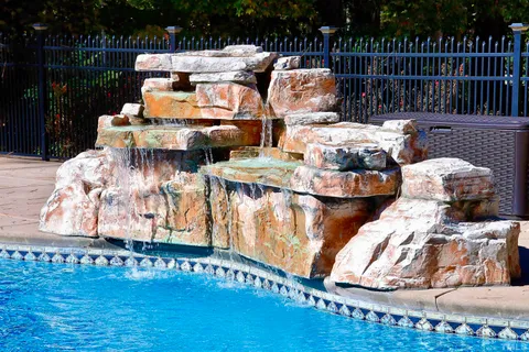 a view of a deck with table and chairs with wooden fence and floor