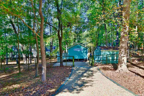 a view of a livingroom with wooden floor and closet