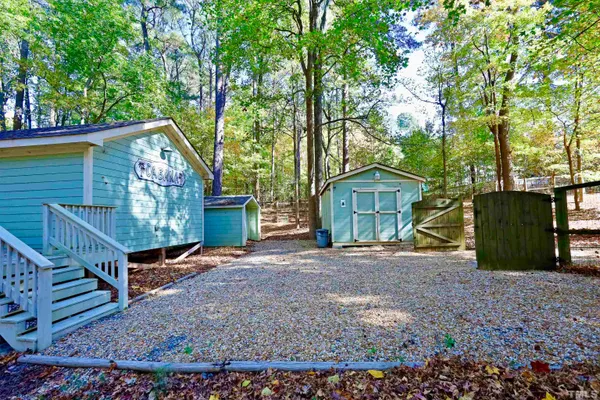 a view of kitchen with furniture and wooden floor
