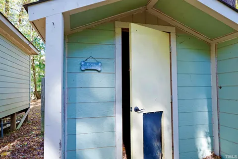 a view of outdoor space with deck and trees