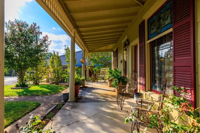 a view of a porch with garden