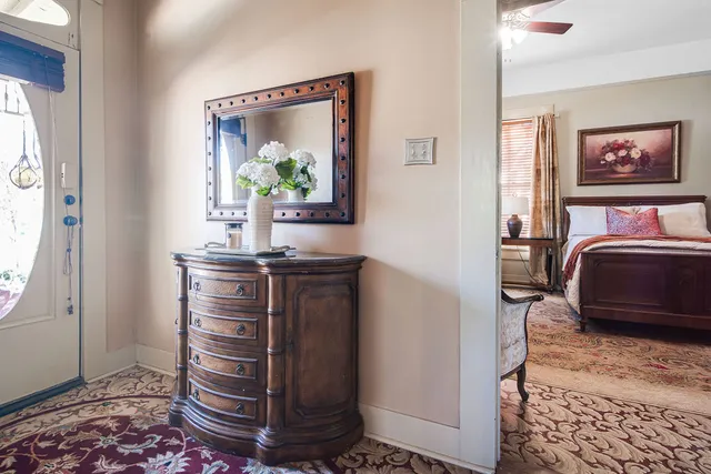 a living room with furniture and a window