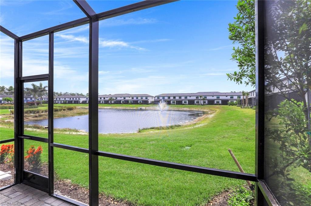 7473 Rockefeller Drive Naples, FL 34119 - Photo 16 of 19 a view of swimming pool from a balcony
