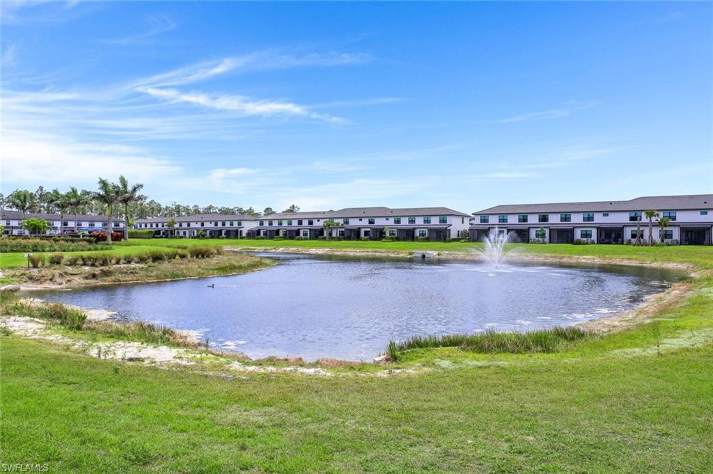 7473 Rockefeller Drive Naples, FL 34119 - Photo 17 of 19 a view of a city with swimming pool and lake view
