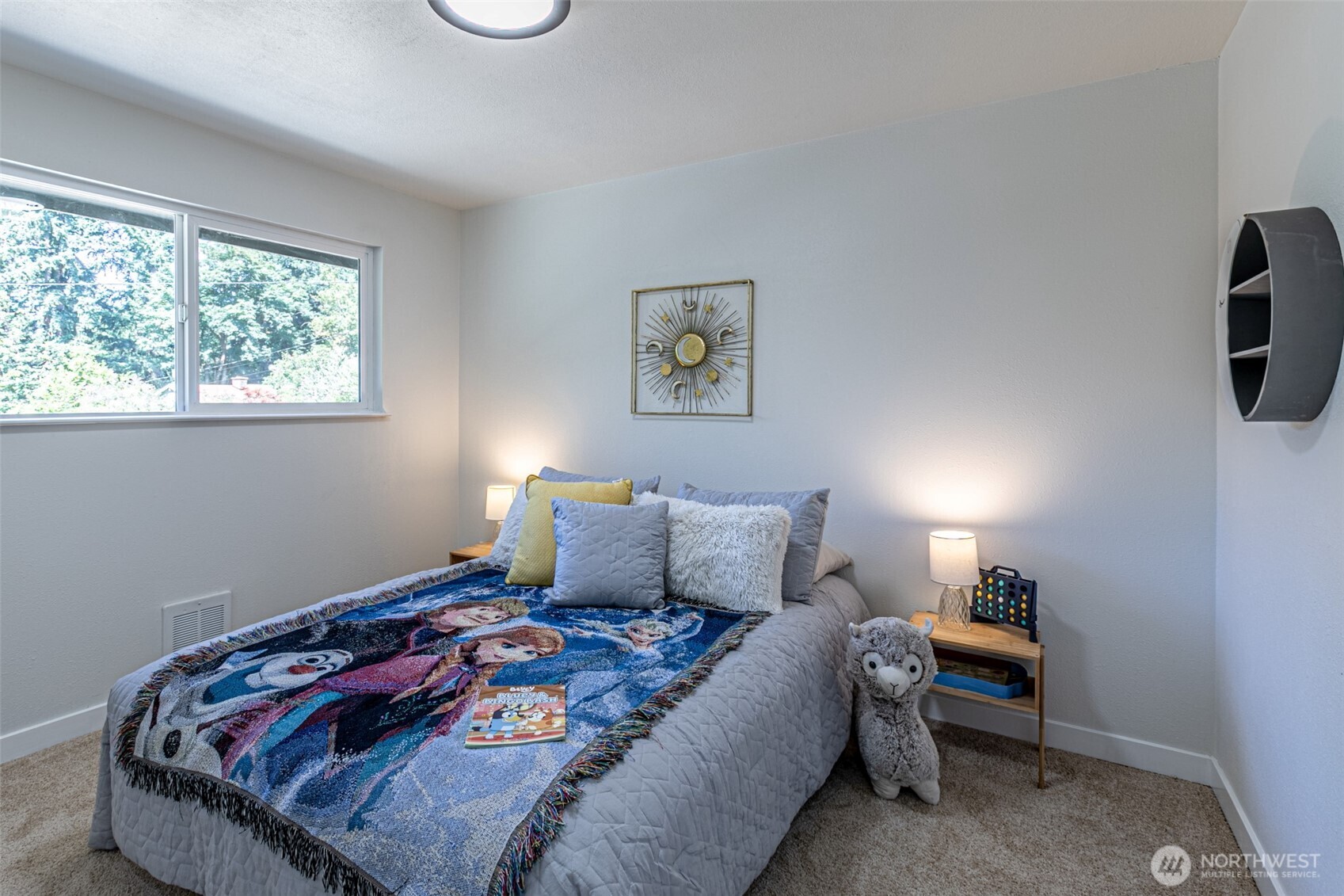 14224 180th Avenue Southeast Renton, WA 98059 - Photo 14 of 26 a bedroom with a bed and window