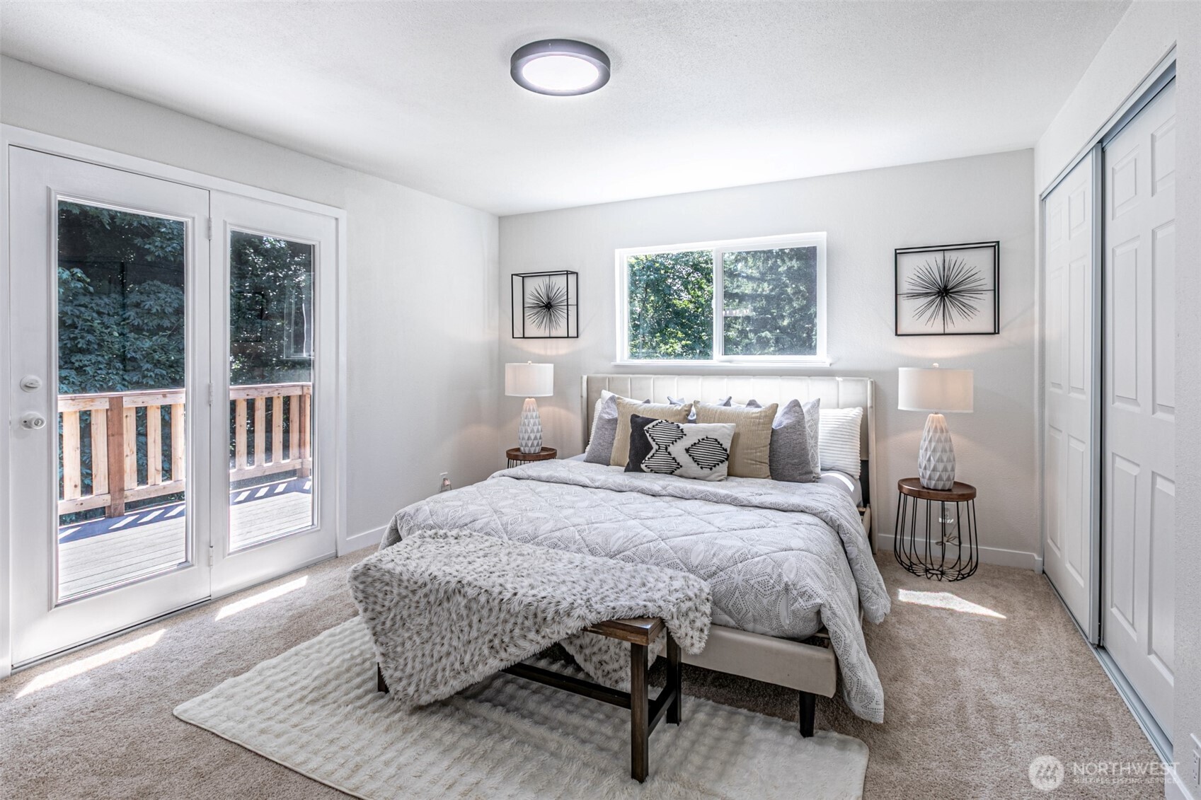 14224 180th Avenue Southeast Renton, WA 98059 - Photo 16 of 26 a bedroom with a bed and a large window