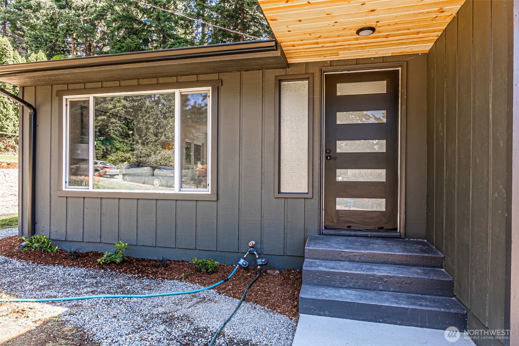 14224 180th Avenue Southeast Renton, WA 98059 - Photo 2 of 26 a front view of a house with entryway