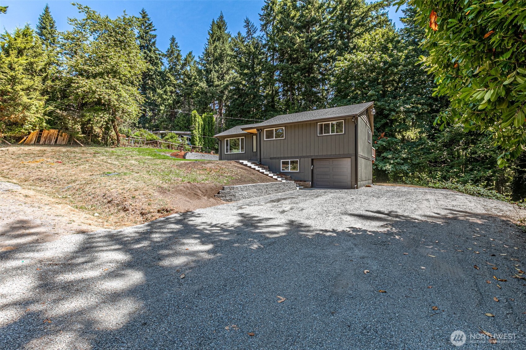 14224 180th Avenue Southeast Renton, WA 98059 - Photo 24 of 26 a view of a house with a yard