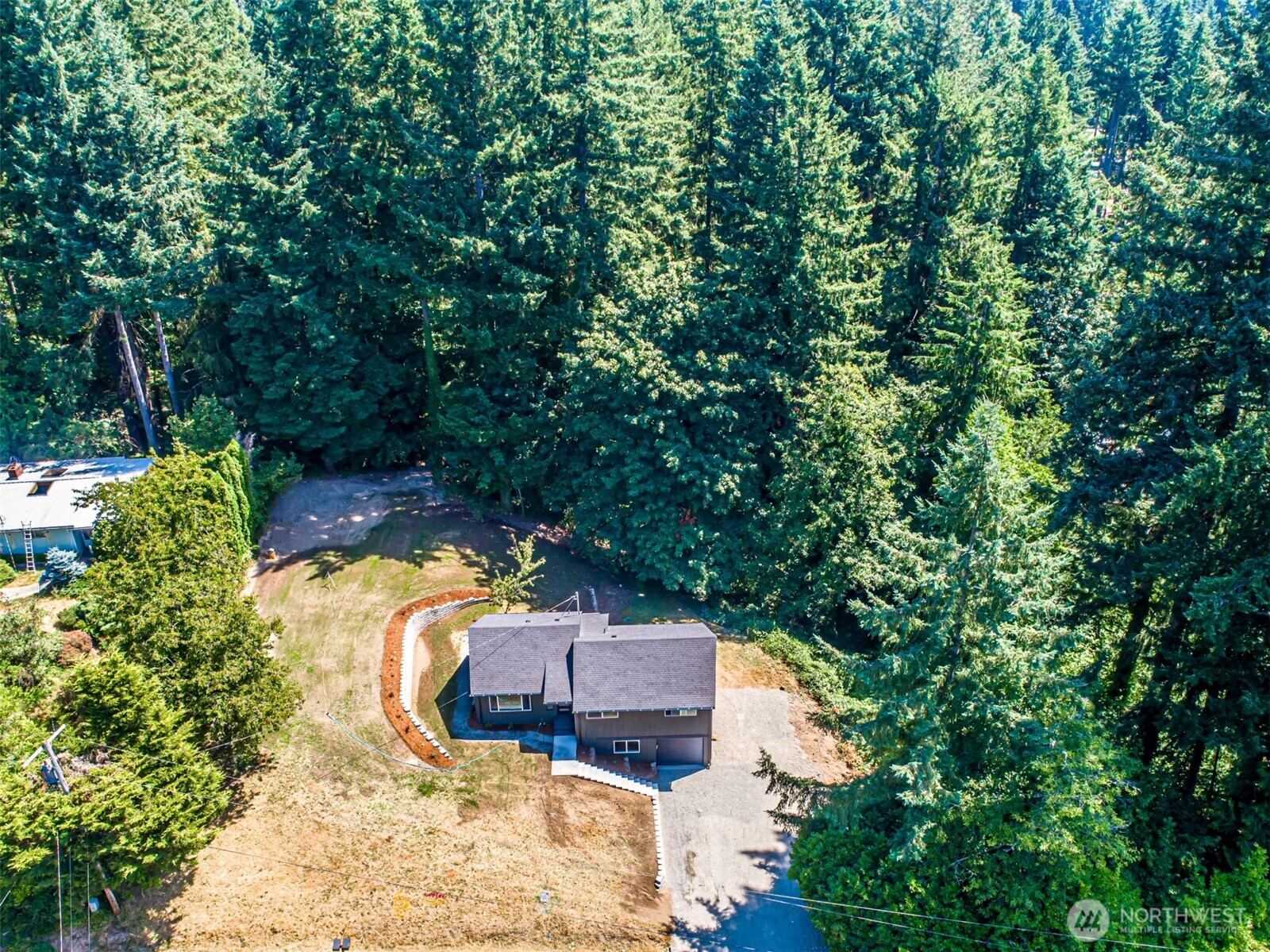 14224 180th Avenue Southeast Renton, WA 98059 - Photo 25 of 26 a view of a house with a yard and sitting area