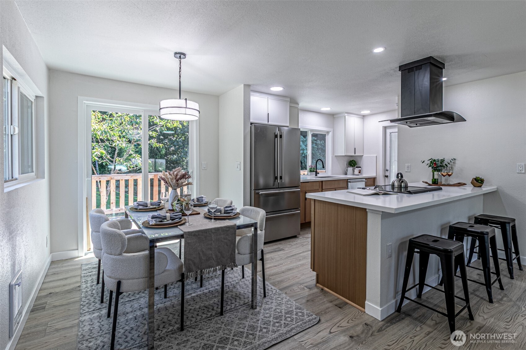 14224 180th Avenue Southeast Renton, WA 98059 - Photo 4 of 26 a view of a dining room with furniture window and outside view