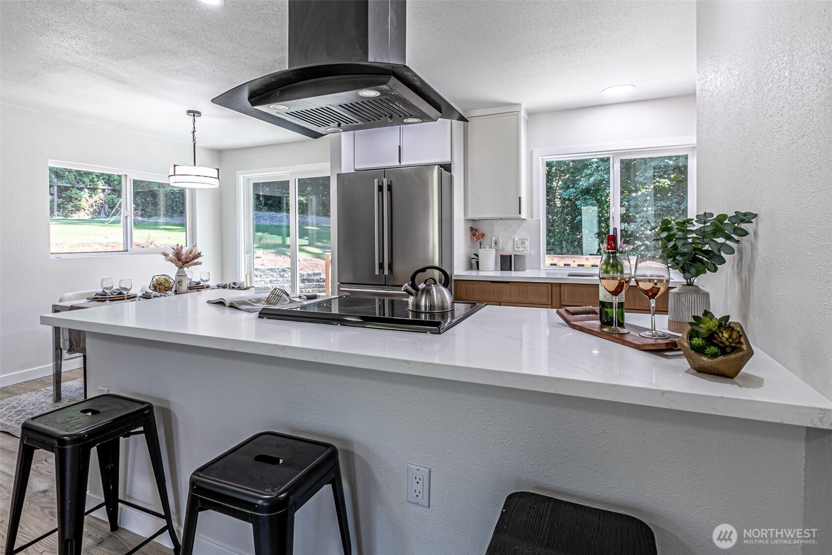 14224 180th Avenue Southeast Renton, WA 98059 - Photo 5 of 26 a kitchen with a sink and a large window