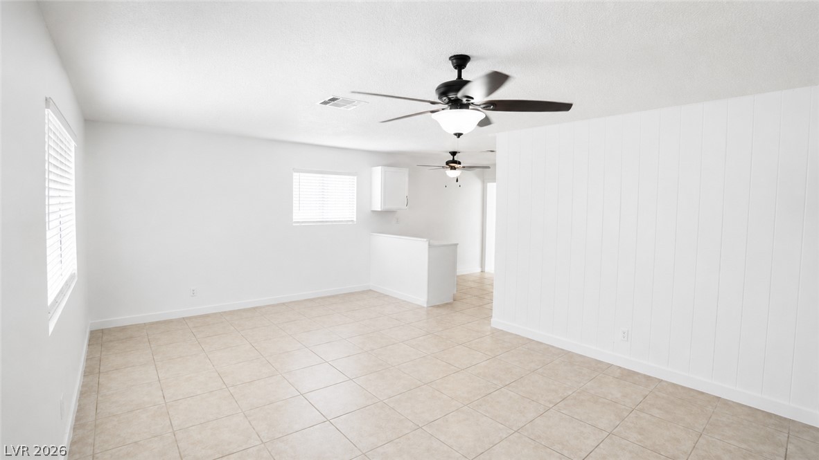 2870 South Sandhill Road Las Vegas, NV 89121 - Photo 56 of 64 Freshly updated interiors with crisp walls and practical tile flooring.