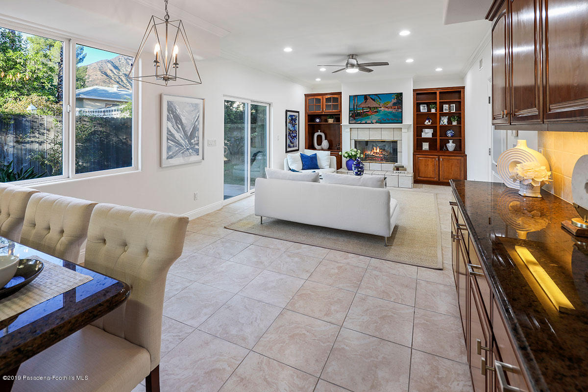 7215 Summitrose Street Tujunga, CA 91042 - Photo 18 of 47 a living room with furniture and a flat screen tv