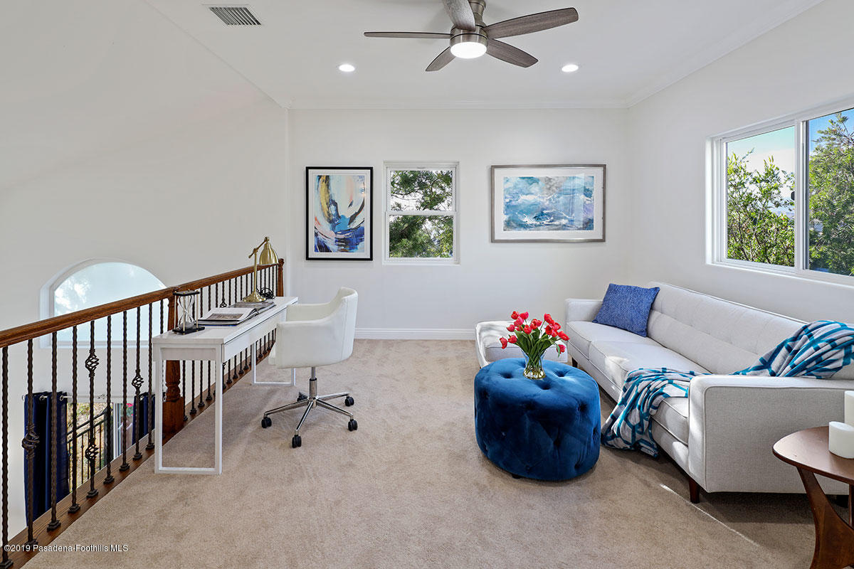 7215 Summitrose Street Tujunga, CA 91042 - Photo 27 of 47 a living room with furniture and a window