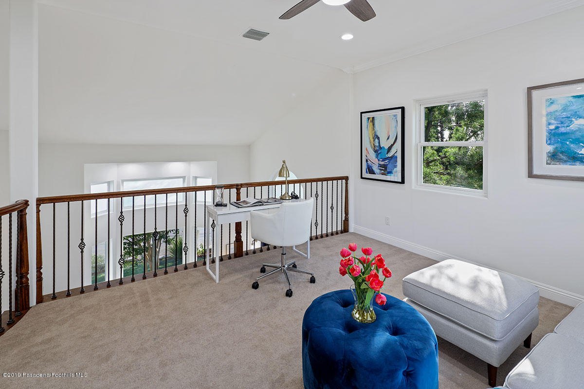 7215 Summitrose Street Tujunga, CA 91042 - Photo 28 of 47 a living room with furniture and a potted plant