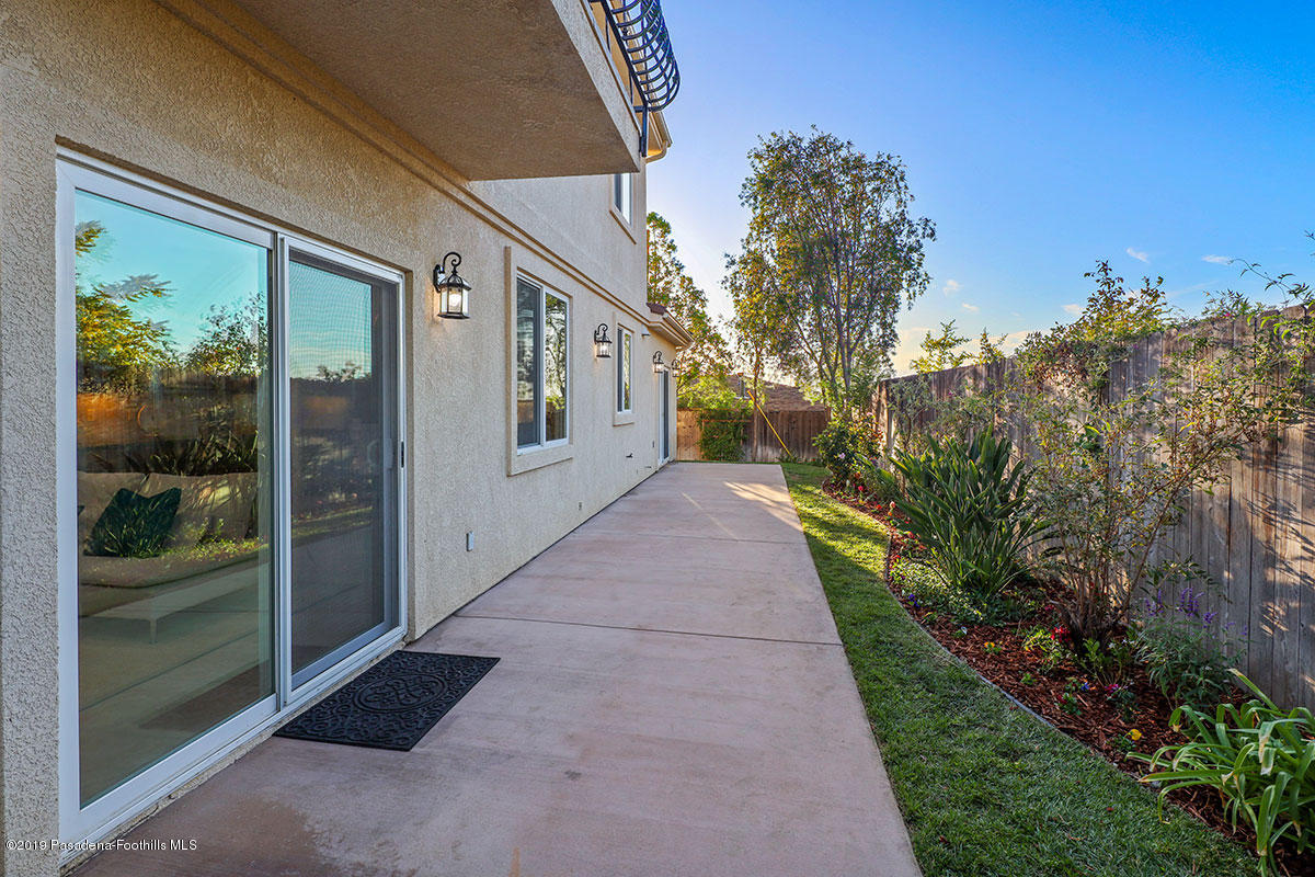 7215 Summitrose Street Tujunga, CA 91042 - Photo 45 of 47 a view of a pathway both side of house