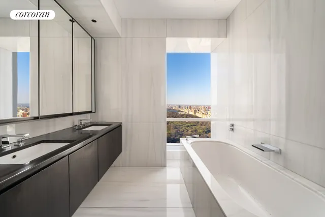 a view of an empty room with glass door