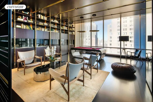 a view of a livingroom with furniture