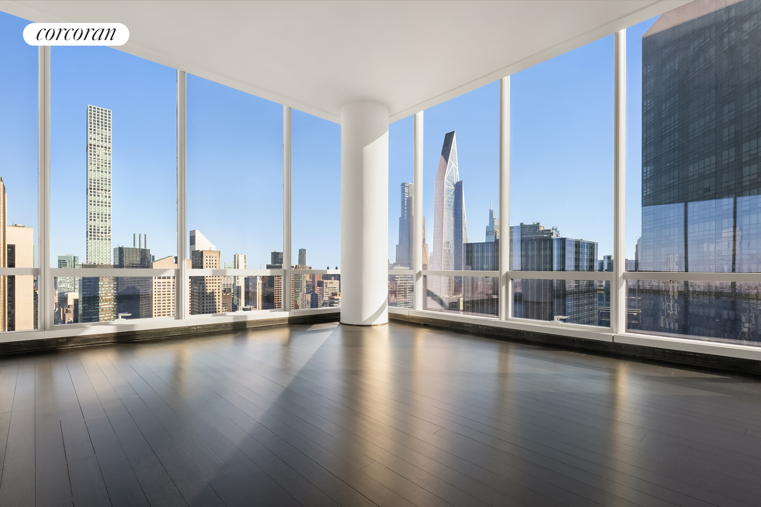 157 West 57th Street, Unit 56C Manhattan, NY 10019 - Photo 3 of 29 a view of a living room with floor to ceiling window and wooden floor