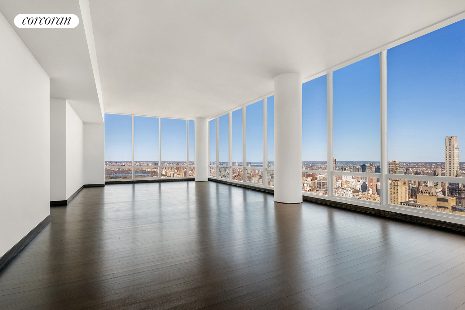 157 West 57th Street, Unit 56C Manhattan, NY 10019 - Photo 4 of 29 a view of a living room hardwood floor and a kitchen