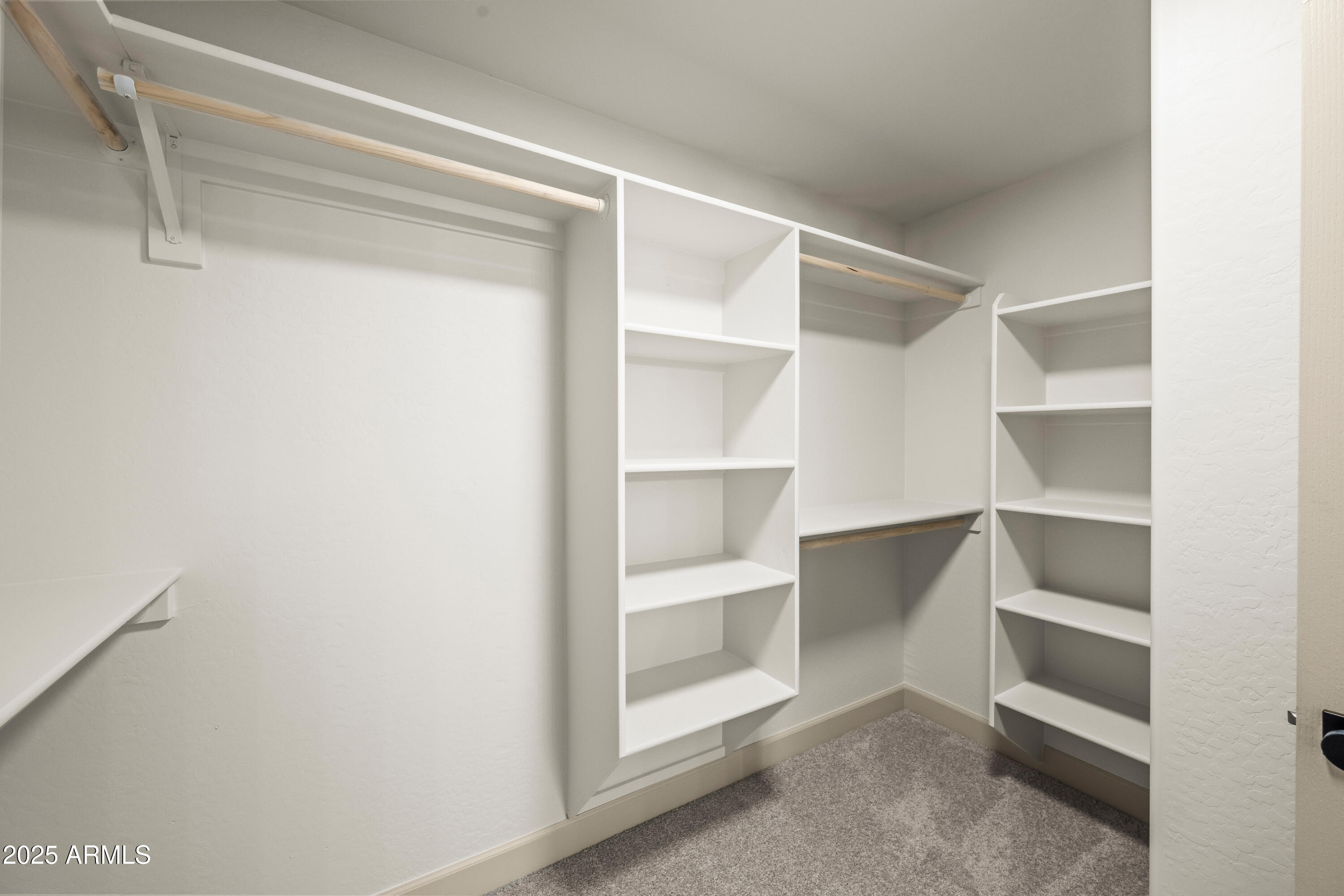 3745 East Flamingo Way Gilbert, AZ 85297 - Photo 12 of 25 a view of an empty walk in closet