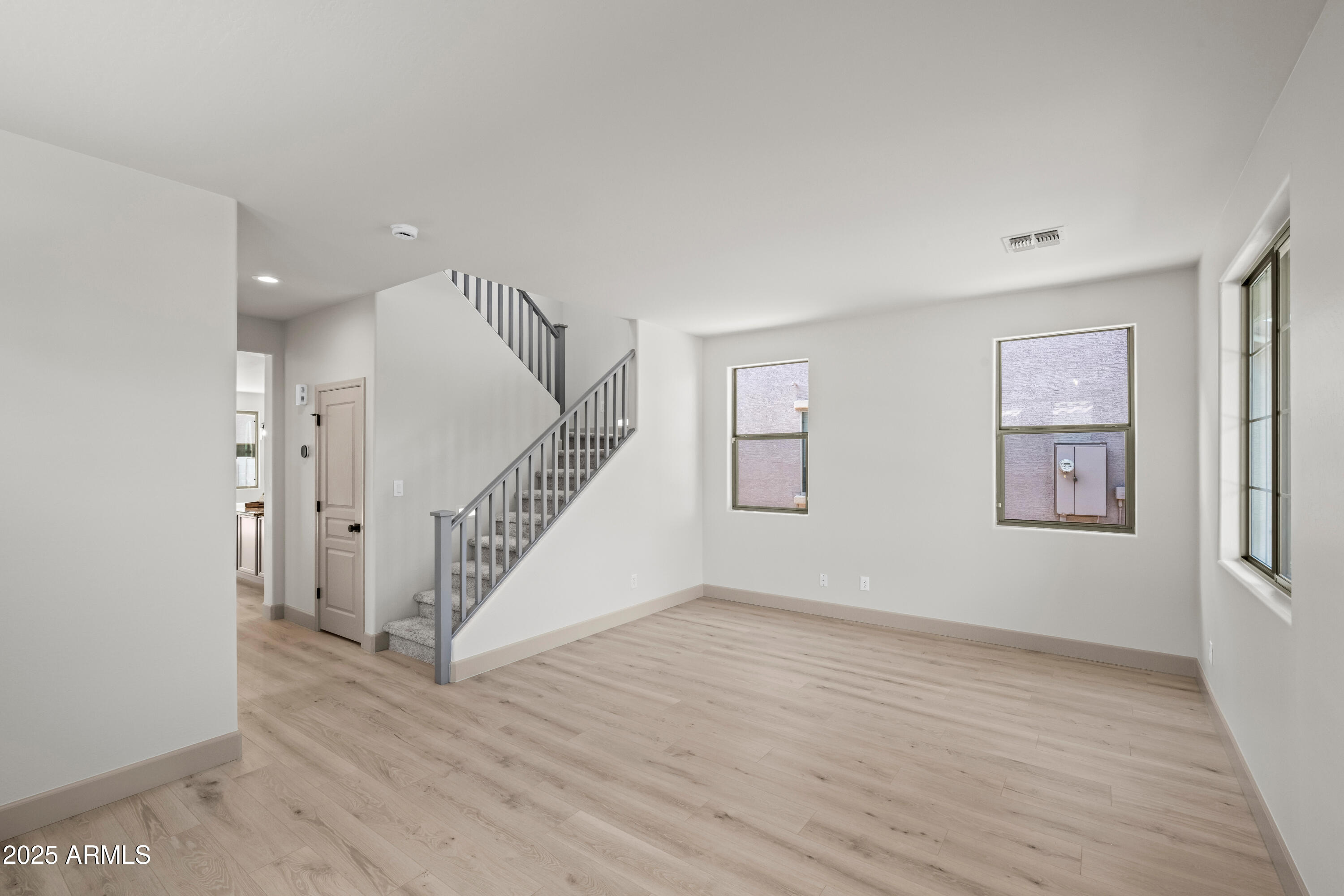 3745 East Flamingo Way Gilbert, AZ 85297 - Photo 18 of 25 a view of an entryway with wooden floor
