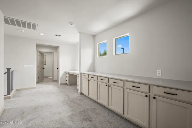 a view of a hallway with closet
