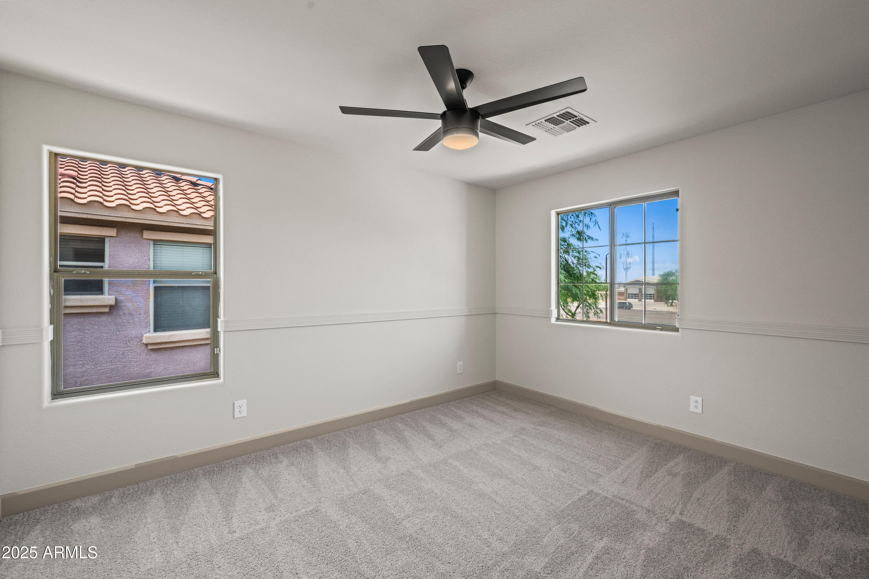 3745 East Flamingo Way Gilbert, AZ 85297 - Photo 22 of 25 a view of empty room with window and ceiling fan