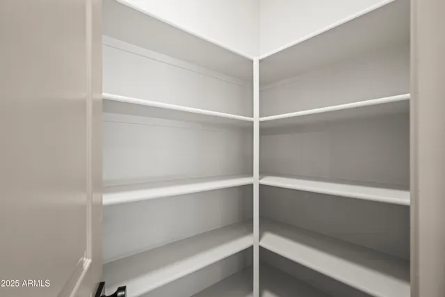 a empty closet with white paint