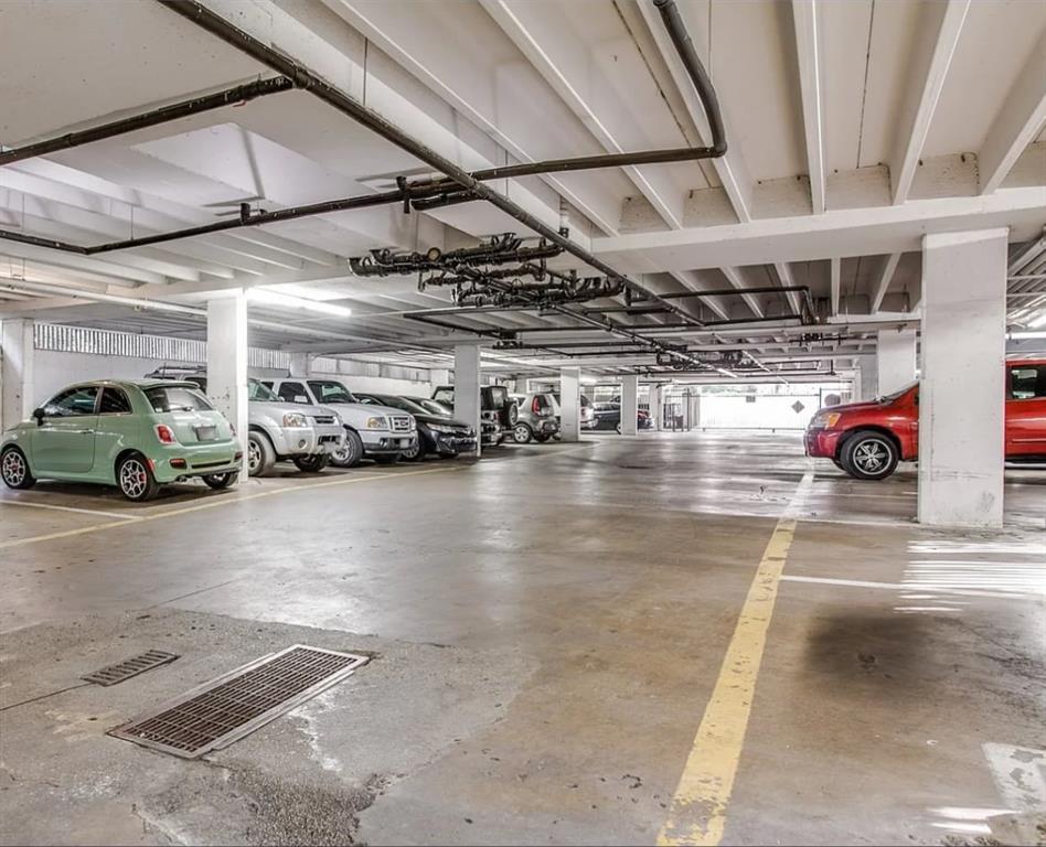 4845 Cedar Springs Road, Unit 170 Dallas, TX 75219 - Photo 3 of 26 a view of parking space with parked cars
