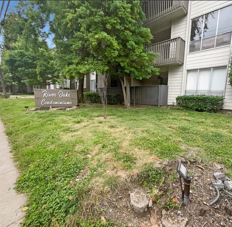 4845 Cedar Springs Road, Unit 170 Dallas, TX 75219 - Photo 6 of 26 a tall tree in middle of the green field