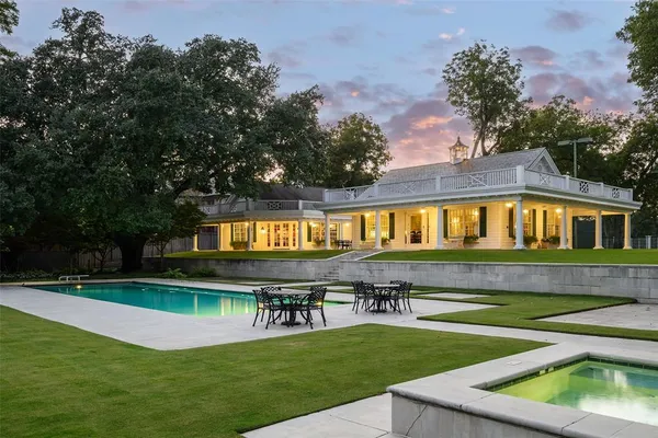 a view of a house with a swimming pool