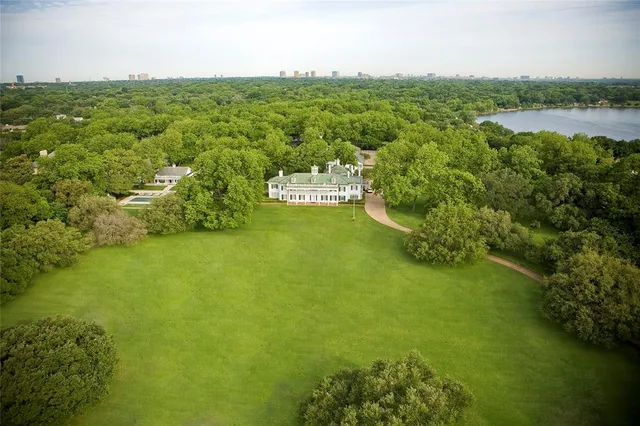 a view of a lake with a city