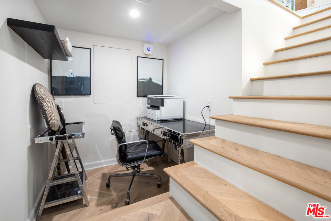 1570 Queens Road Los Angeles, CA 90069 - Photo 29 of 41 a view of workspace with wooden floor windows
