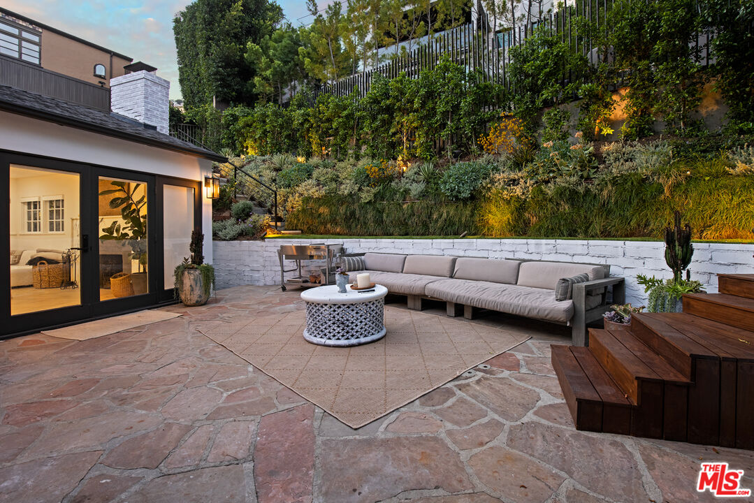 1570 Queens Road Los Angeles, CA 90069 - Photo 31 of 41 a living room with patio furniture and a potted plant