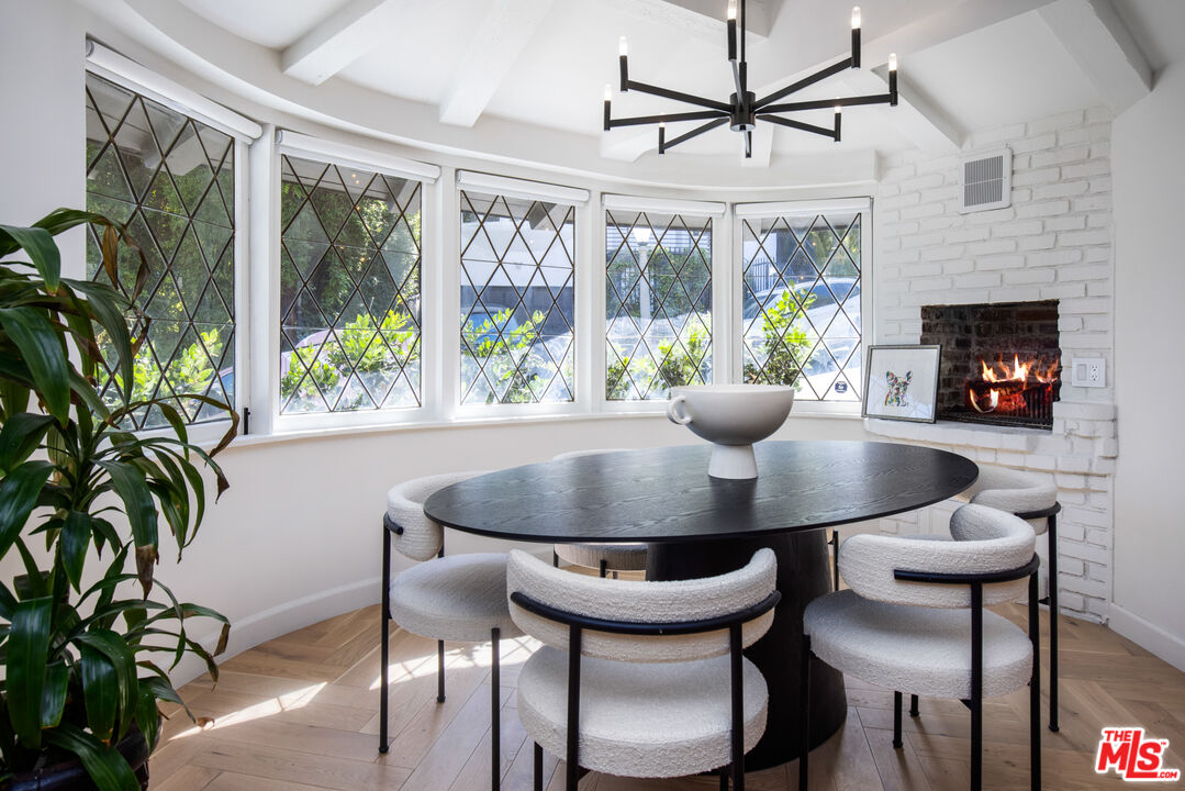 1570 Queens Road Los Angeles, CA 90069 - Photo 8 of 41 a view of a dining room with furniture window and outside view
