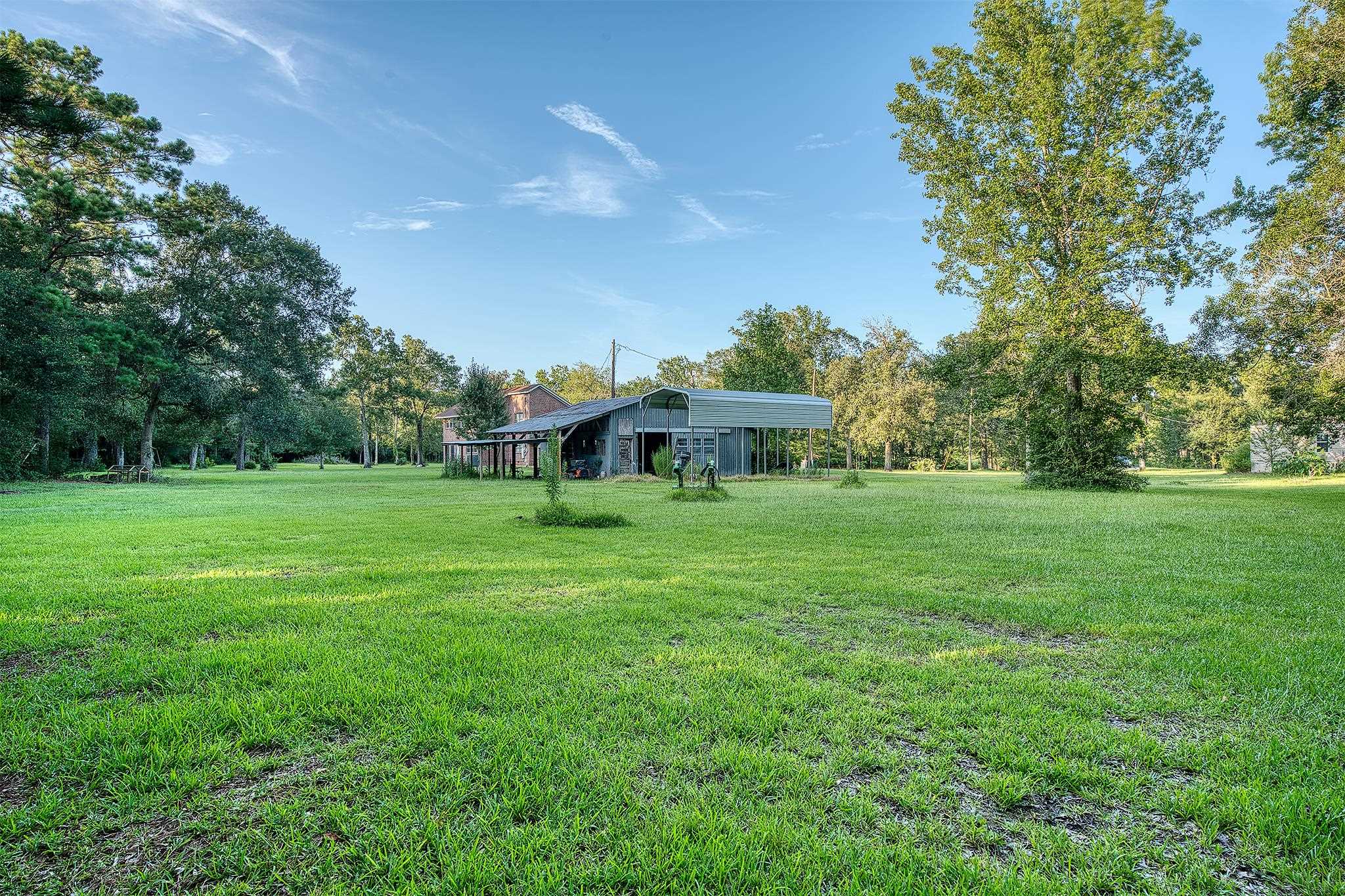 7476 Foard Road Beaumont, TX 77705 - Photo 49 of 49 a view of a house with a big yard