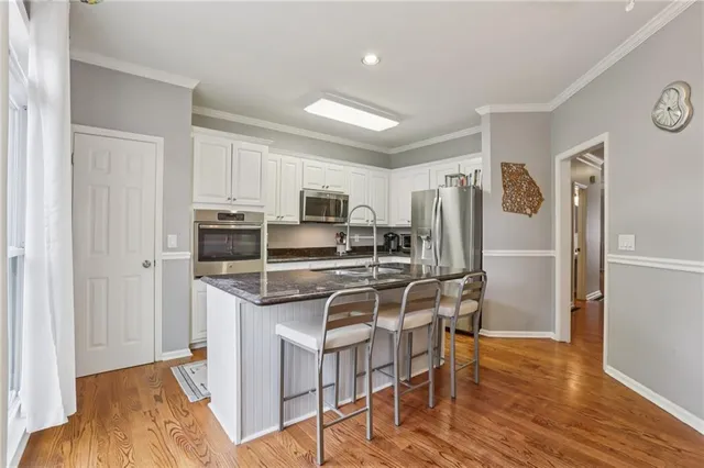 a view of a workspace with furniture