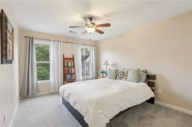 a view of swimming pool with trees in background