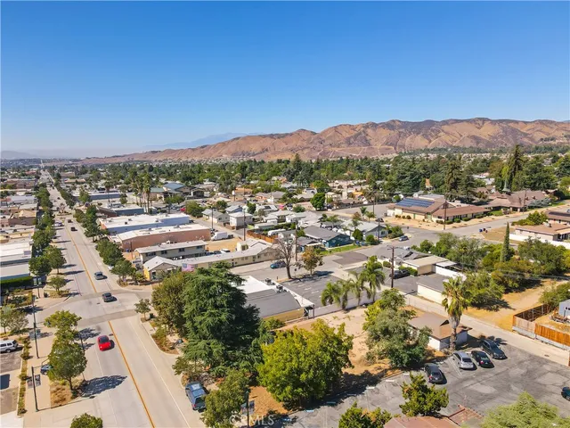 an aerial view of residential house and green space