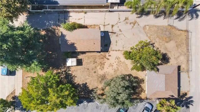 an aerial view of residential house with outdoor space