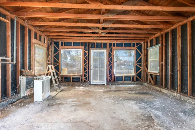 a view of a room with wooden walls